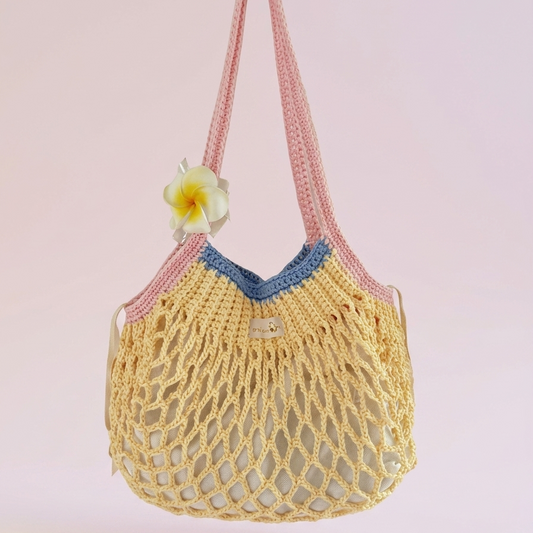 Handmade mesh tote bag crochet pattern with soft summer colors